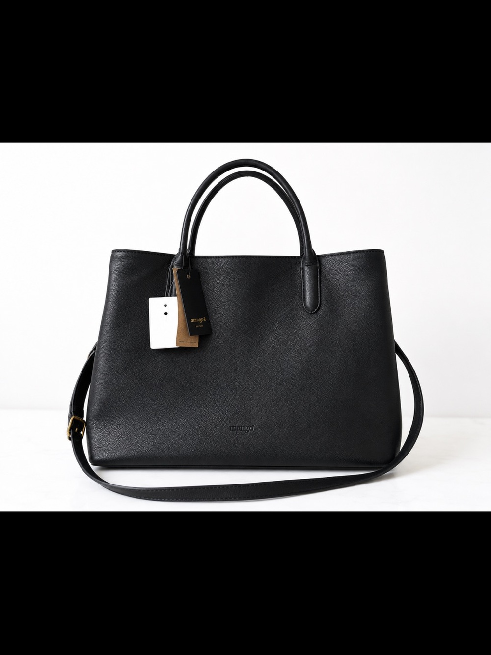 Elegant Black Leather Satchel with Top Handles and Crossbody Strap